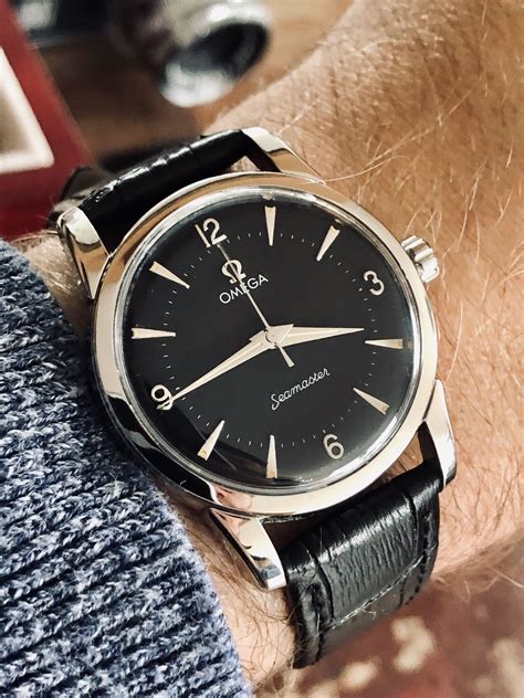 vintage omega seamaster black face.